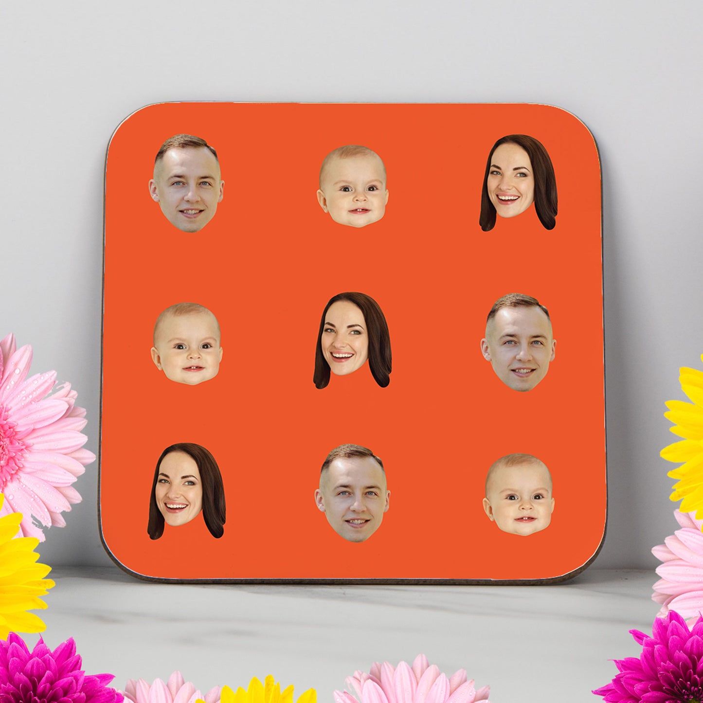 Personalised photo coaster with up to three family faces repeated on a bright background. Custom printed gift with glossy finish, ideal for birthdays, Christmas or family keepsakes.