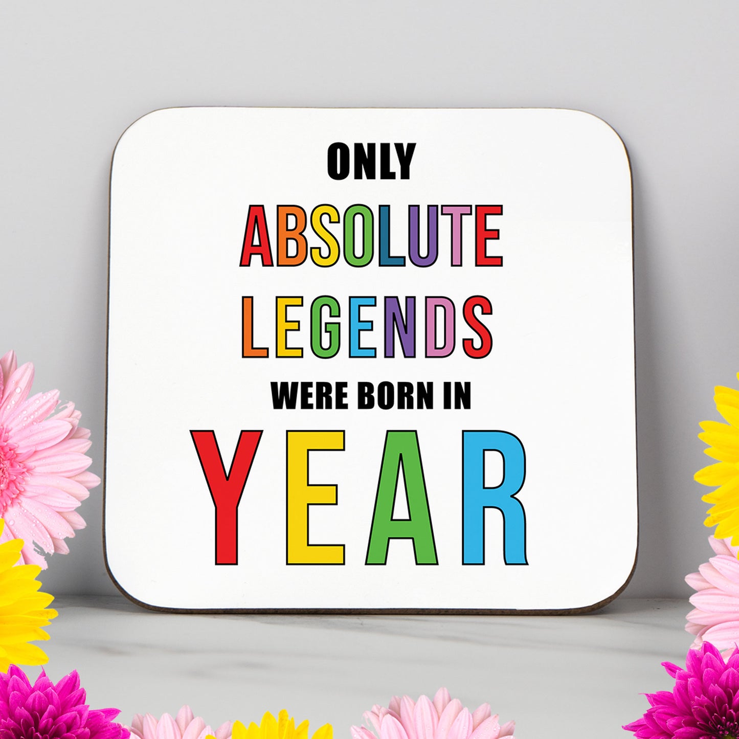 Only Absolute Legends Were Born In... personalised birthday coaster featuring rainbow text on white background. Custom milestone birthday gift for friend, dad, mum, sister or brother. Choose any year from 1920s to 2020s for a fun, vibrant keepsake. Glossy square coaster for celebrating 18th, 21st, 30th, 40th, 50th or 60th birthdays. Unique personalised gift idea with bold design and humour.
