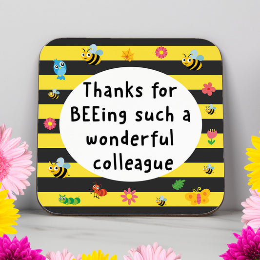 Bee-themed coaster with the message “Thanks for BEEing such a wonderful colleague” on a striped yellow and black background. A cheerful and heartfelt gift for a coworker, boss, or work friend.